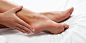 applying-cream-on-feet-royalty-free-image-1571584082