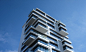 White Concrete Building Under Sunny Blue Sky