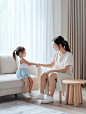 ls7623_A_young_Chinese_mother_wearing_light_colored_is_sitting__5a8f5839-2d39-41cc-b834-5f6c0c5f3489