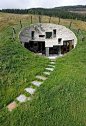 This underground concrete home is the brainchild of SeArch and Christian Müller Architects. Located in Vals, Switzerland there are a myriad of famous thermal baths with amazing views nearby so in order to build close to the baths, the architects buried th