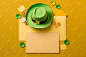 A green hat and a green hat sit on a yellow envelope with a blank card for coins and coins.