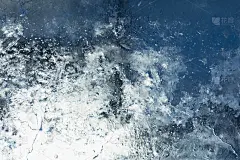 冰的质地。冷冻水。冬天的背景