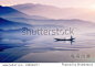 man riding boat in a  foggy winter morning infront of a beautiful  mountain in lake in bangladesh