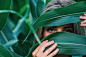 Woman Covering Her Face With Corn Leaves