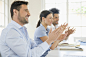 Business people applauding in conference room by Gable Denims on 500px