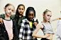 Portrait of girls in hip hop dance group standing in studio after practice