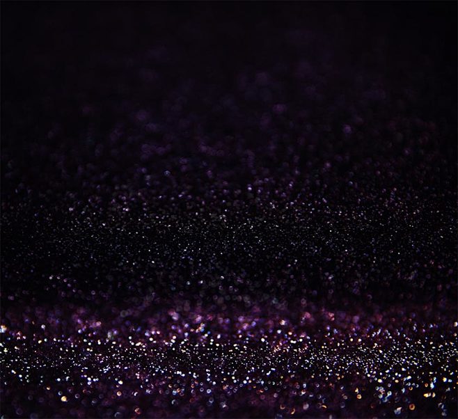 浪漫的紫色光斑颗粒背景图片