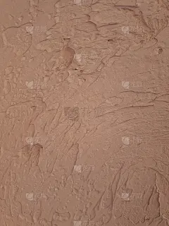 墙壁纹理-粉红色的装饰石膏。为背景