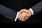 Businespeople shaking hands