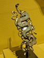 Belt hook in the shape of a coiled dragon Warring States Period - Early Western Han Dynasty China 4th-3rd century BCE Nephrite and gilt bronze : Photographed at the Portland Art Museum in Portland, Oregon.