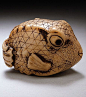 Blowfish, 18th century, Japan.  Artist Masaboa.  Netsuke with staining, sumi and inlays.  LACMA