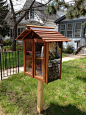 Marilyn Matheny. Minneapolis, MN. The Library is dedicated to my son, Michael, who died in 2012, at age 45. The art and images on the library are all related to books and to Holland, where he was born. There is a photo he took of a street bookseller in Am