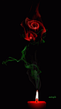 Фото Горящая свеча, с дымом в виде цветка розы