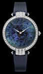 Harry Winston Premier Feathers watch. The dial is decorated with ring-necked pheasant feathers for an unusual look and the bezel and lugs are set with diamonds.