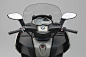 This may contain: the front view of a motorcycle with its windshield up