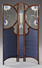 A LEADED GLASS AND STAINED OAK THREE-PANEL SCREEN WIENER MOSAIC WERKSTÄTTE, ATTRIBUTED, CIRCA 1905