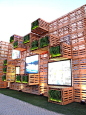 Pavilion Covered with 7,000 recycled wood pallets and several LED screen at Rio+20 Exhibition, Rio De Janerio, Brazil. Photo by Paula Alvarado.