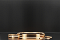 three-golden-thoughts-your-design-dark-background-cylindrical-pole-golden-trumpet-museum-stage-product-pedestal-podium-3d-render