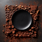 Frame of different chocolates and cocoa powder with black plate for the text on a dark background