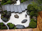 Japanese Inspired Gardens - white gravel, raised slab walkway, grey brick edging, manicured shrubs