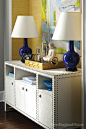 Amazing yellow & blue foyer with yellow gold grasscloth