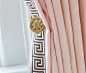 Brass rosettes and trim on drapes | House 