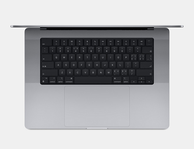 一台深空灰色 MacBook Pro 的...