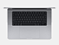 一台深空灰色 MacBook Pro 的俯视图，展示妙控键盘和触控板。