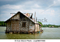 Float bamboo house on tropical river  - csp25601538
