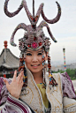 Mongolian woman at cultural event.