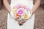 Bride holding bouquet of flowers, cropped by photoalto on 500px