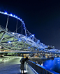 The Helix Bridge is a pedestrian bridge that stretches across the head of a river in Singapore, connecting the Bayfront District to the Central Business District.