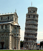 比萨斜塔（意大利语：Torre pendente di Pisa或Torre di Pisa）是意大利比萨城大教堂的独立式钟楼，于意大利托斯卡纳省比萨城北面的奇迹广场上。广场的大片草坪上散布着一组宗教建筑，它们是大教堂（建造于1063年—13世纪）、洗礼堂（建造于1153年—14世纪）、钟楼（即比萨斜塔）和墓园（建造于1174年），它们的外墙面均为乳白色大理石砌成，各自相对独立但又形成统一罗马式建筑风格。比萨斜塔位于比萨大教堂的后面。