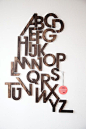 i would love to have something modern-chic like this in the baby's room... an ode to the alphabet, but modern and full of grown-up design that could transfer to any room after the baby has grown, too.