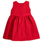 Baby Girls Red Neoprene Dress : Baby girls red neoprene dress by Monnalisa Bebé, featuring cut-out detailing in the fabric, giving a lattice effect. There is a high waistband with a red jewelled bow decorating the front and a concealed zip fastener at the