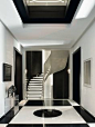 BLACK AND WHITE LUXURY DECOR| minimal decor for a luxury entryway , black an white floor | http://bocadolobo.com/ #modernentryway #entrywayideas