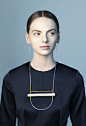 These Γ Γ Earrings are hand made in sterling silver with a goldplating.