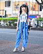 Tokyo Fashion on Instagram: “Twin-tailed Japanese Hatsune Miku fan Misuru (@meguharajuku) on the street in Harajuku wearing an MYOB top with hanging straps, blue cargo…”