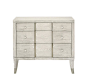Domaine Blanc Bachelor's Chest : W: 34 D:18 H: 29-3/4 White oak solids and quartered white oak veneers Dove White finish Three drawers Stainless steel overlay on center pilasters in Tarnsiehd N