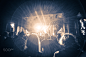 crowd at a concert in a vintage light noise added by Mihai Ologeanu on 500px