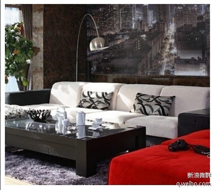 红白黑三种颜色搭配出了空间的时尚感，沙发...
