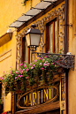 Store Front and flower box in Lucca, Tuscany Italy