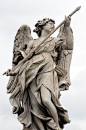 Bernini's marble statue of angel with spear from the Sant' Angelo Bridge in Rome, Italy.