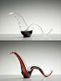 为庆祝2012年龙年，奥地利葡萄酒玻璃制品公司RIEDEL设计了一款龙形葡萄酒壶。这款取名“2012”的葡萄酒壶采用吹制工艺做成，身躯蜿蜒如一条中国龙，RIEDEL希望这款酒壶能给人们带来快乐和好运。 #设计# #产品#