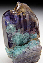 Small green Apatite on Tanzanite crystal