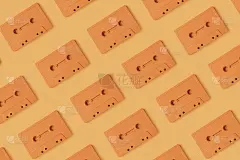 图案与复古磁带在现代橙色背景