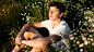 Front view of beautiful boy in nature