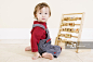 Young Boy Playing with Picture Blocks