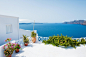 Beautiful terrace with sea view. white architecture on santorini island, greece.