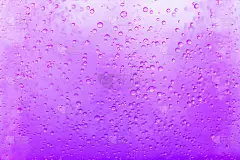 微距拍摄移动油漆滴气泡液体油墨油漆。